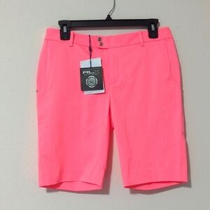 RLX Ralph Lauren women's Neon Rose golf shorts.